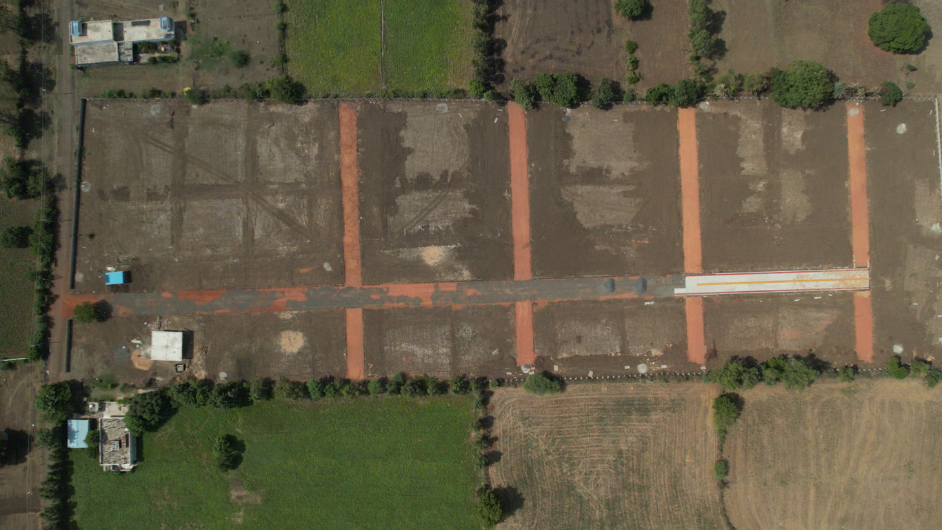 Farmland site visit with expert consultation by Karthikeya Real Estate